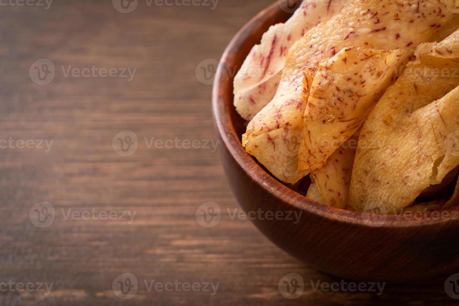 Taro Chips - fried or baked sliced taro photo