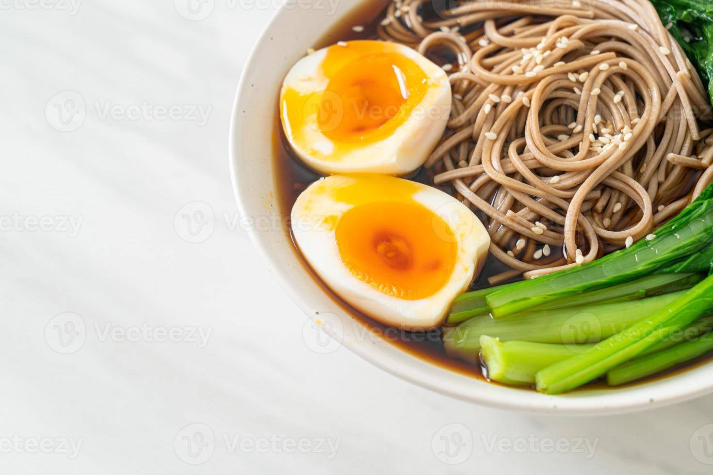 ramen noodles with egg - vegan or vegetarian food style photo