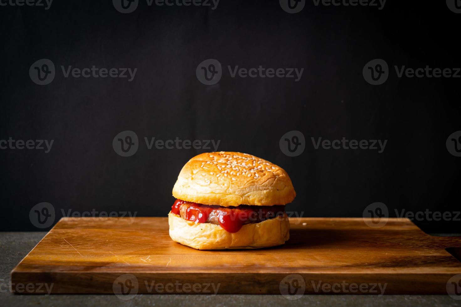 classic pork burger with ketchup photo
