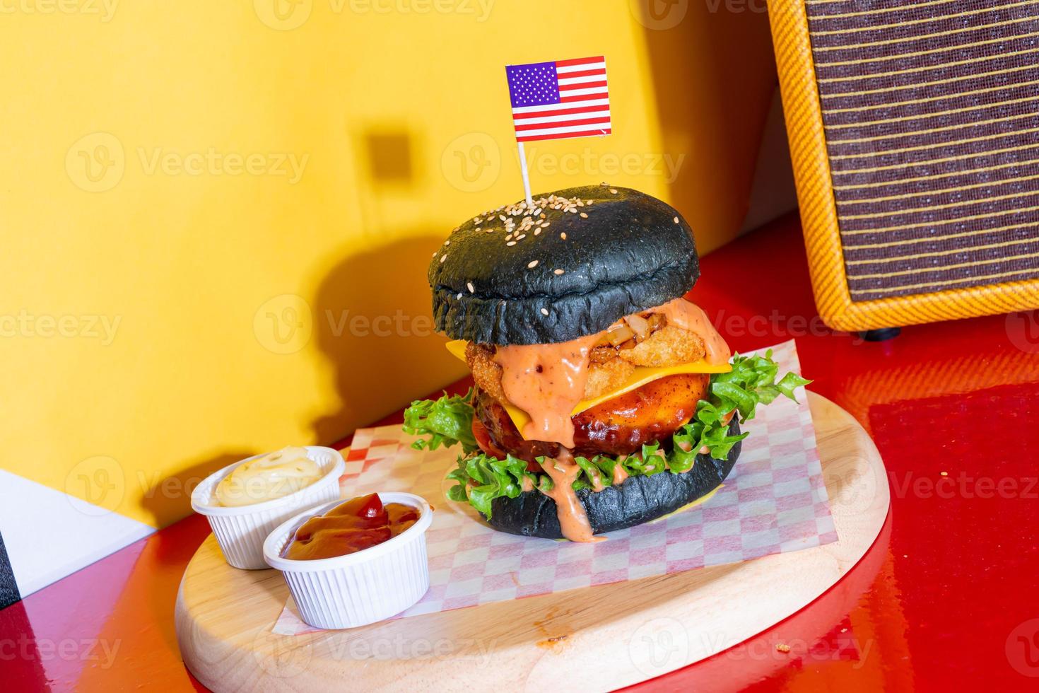 barbecue burger - pork with barbecue sauce with cheese, onion rings and bacon burger photo