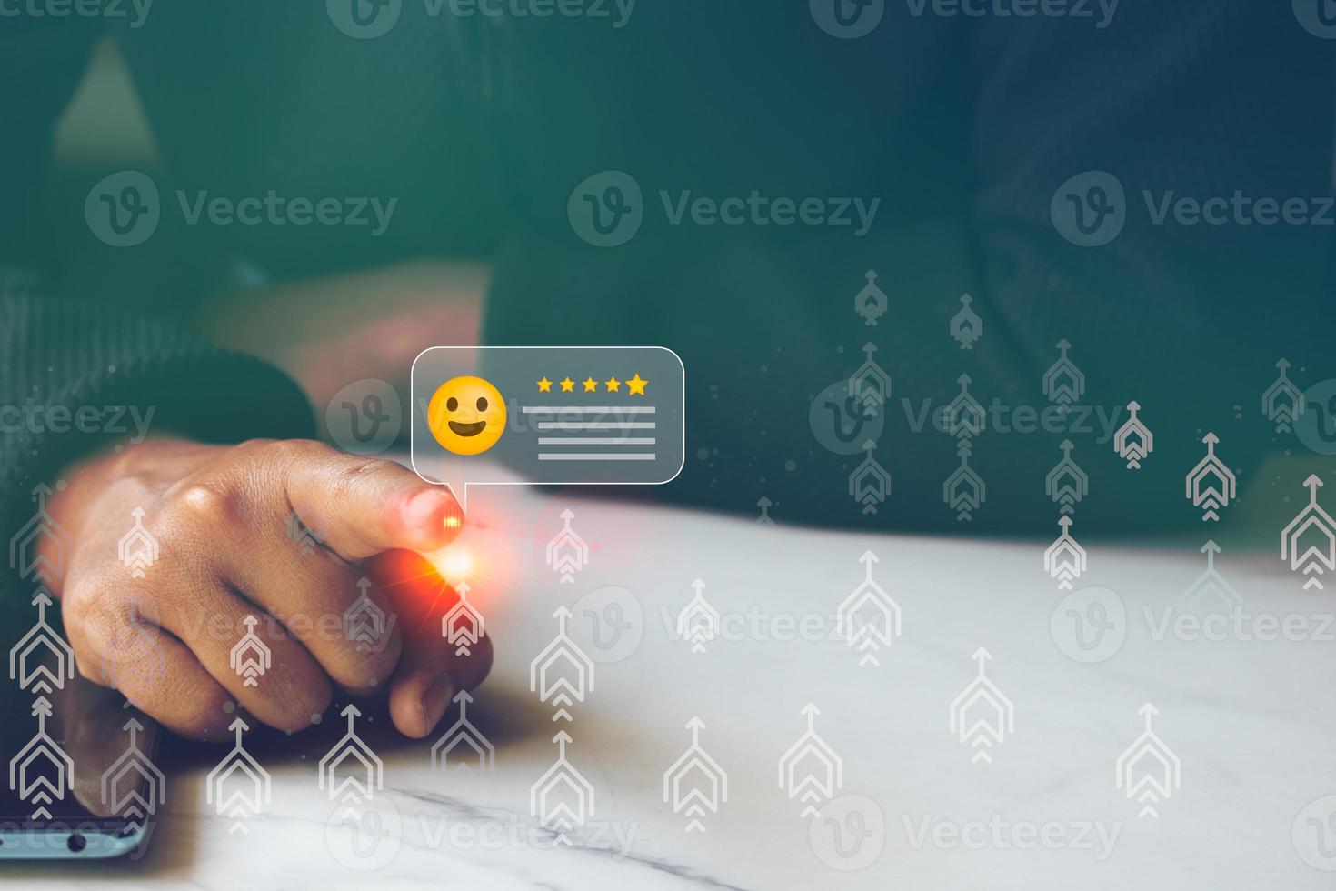 Woman hand using smart phone and give five star symbol to increase rating of product and service concept, Customer service experience photo