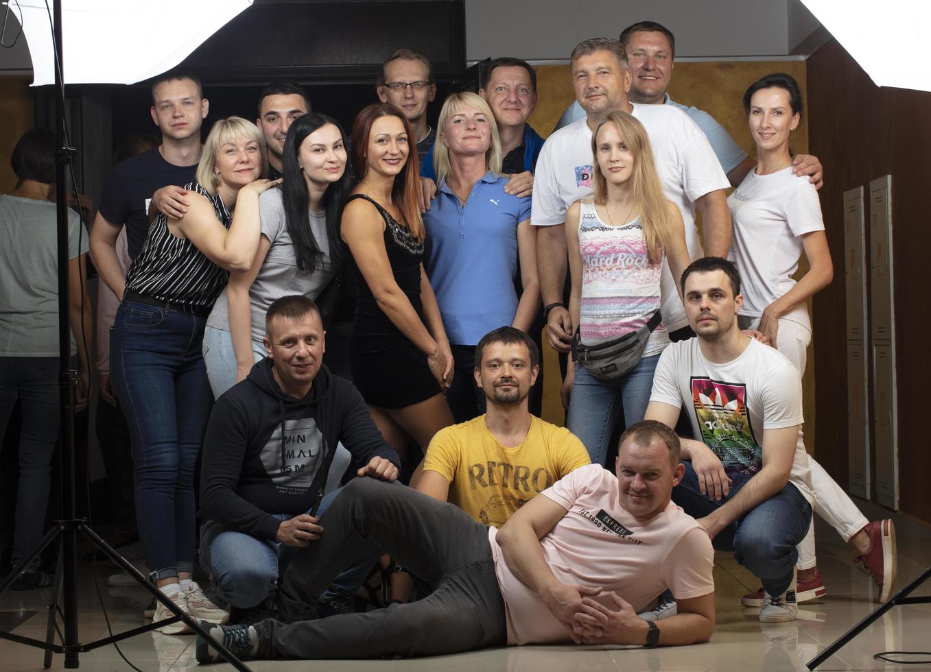 September 04, 2021. Belarus, the city of Gomil. Sports holiday. A group of middle-aged people look at the camera.A group of people or employees stand together for a group portrait. photo