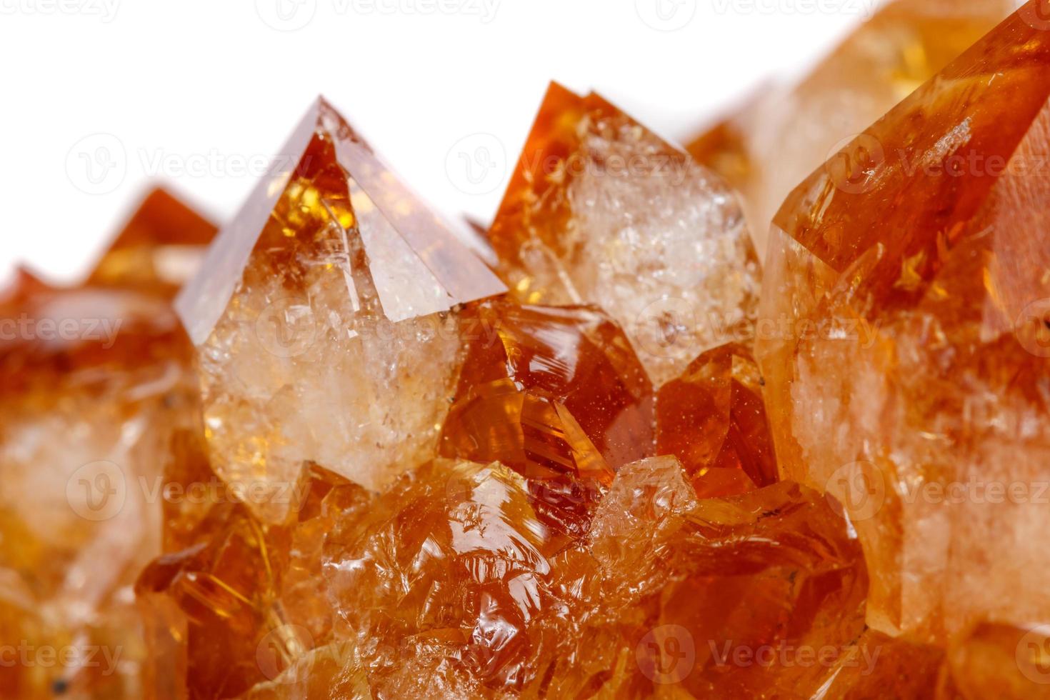 Macro mineral stone Citrine in rock in crystals on a white background photo