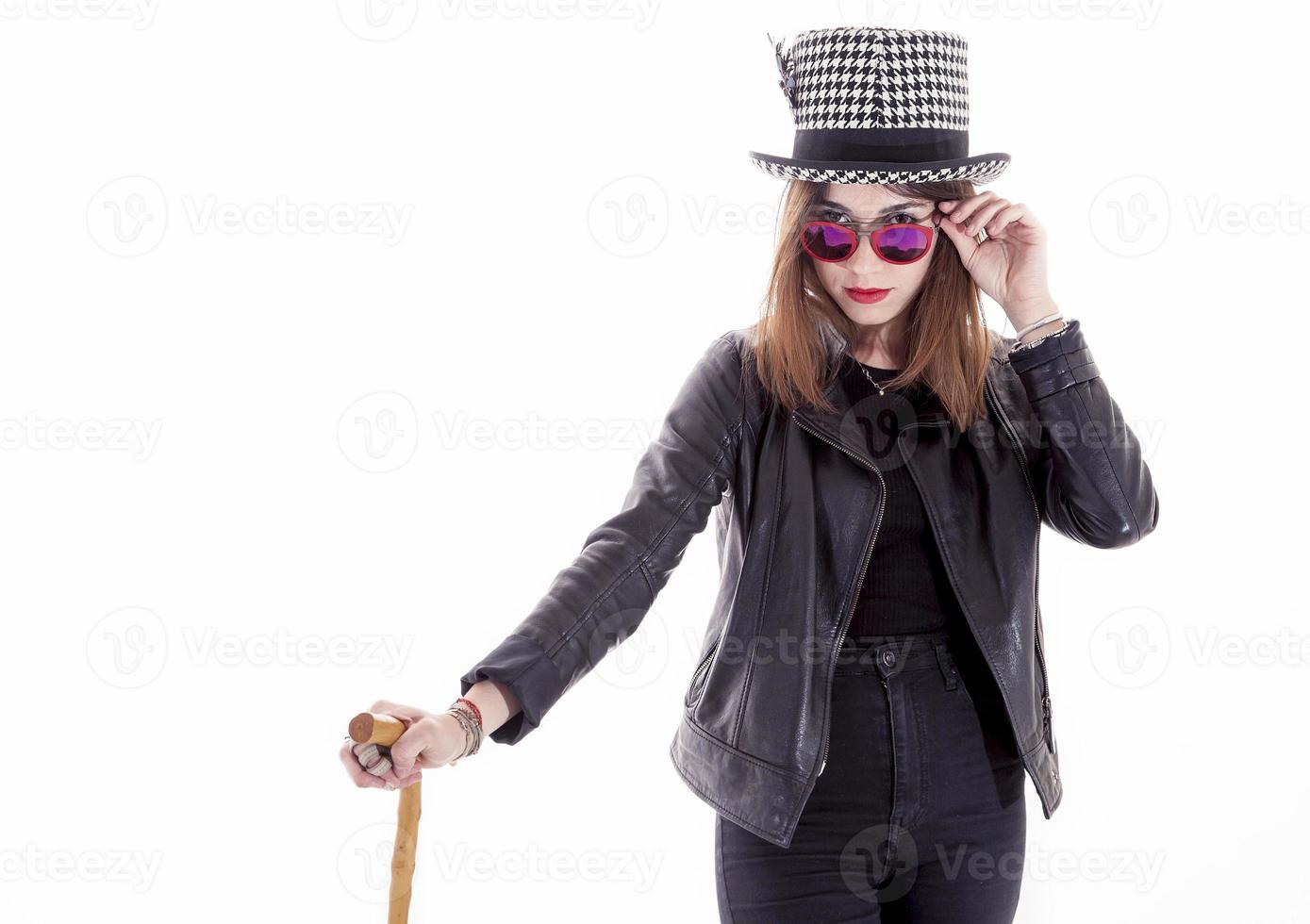 portrait of young girl with hat and red glasses photo