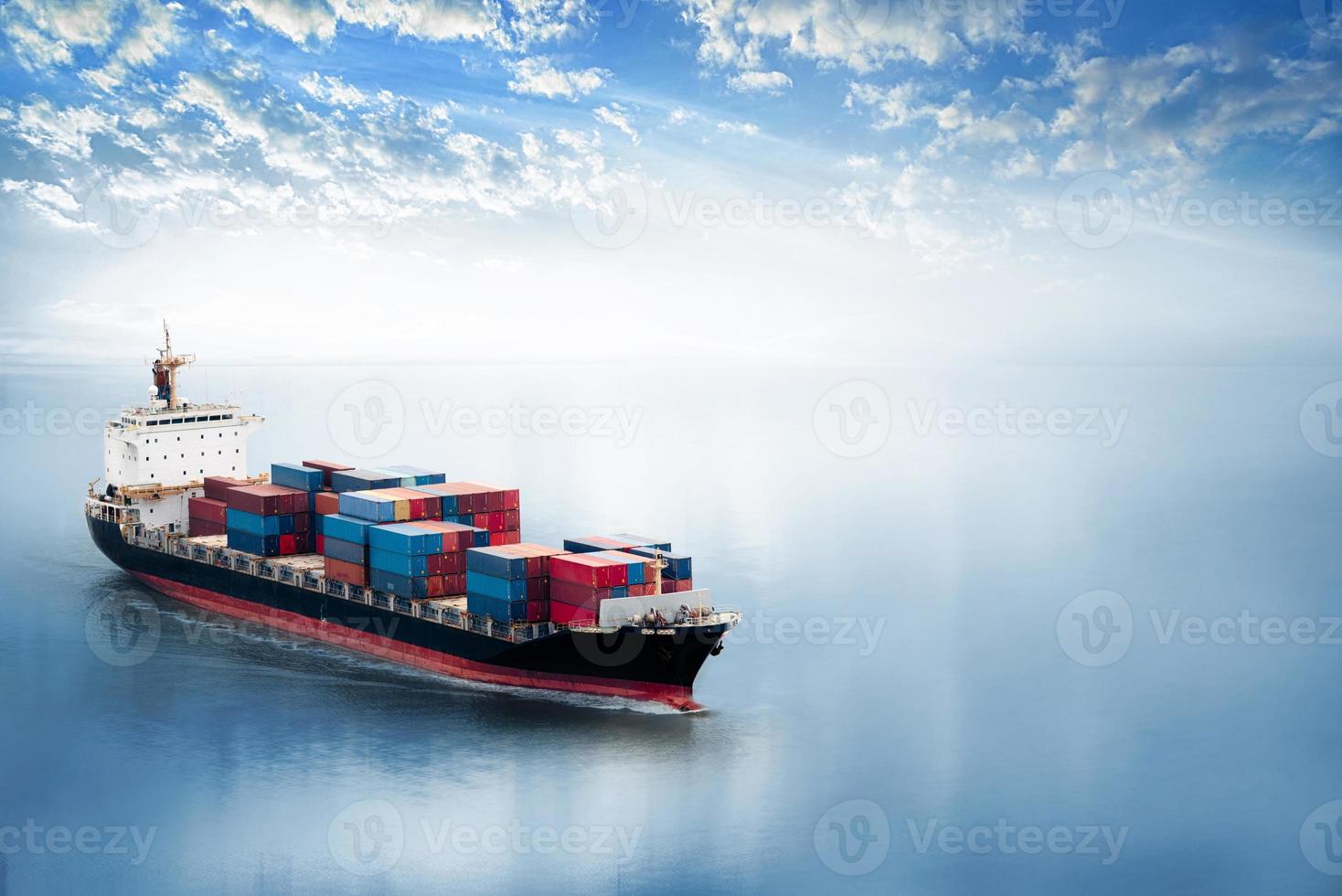 Container cargo ship in the ocean at sunset sky, Global business logistics import export background, Freight transportation, Shipping photo