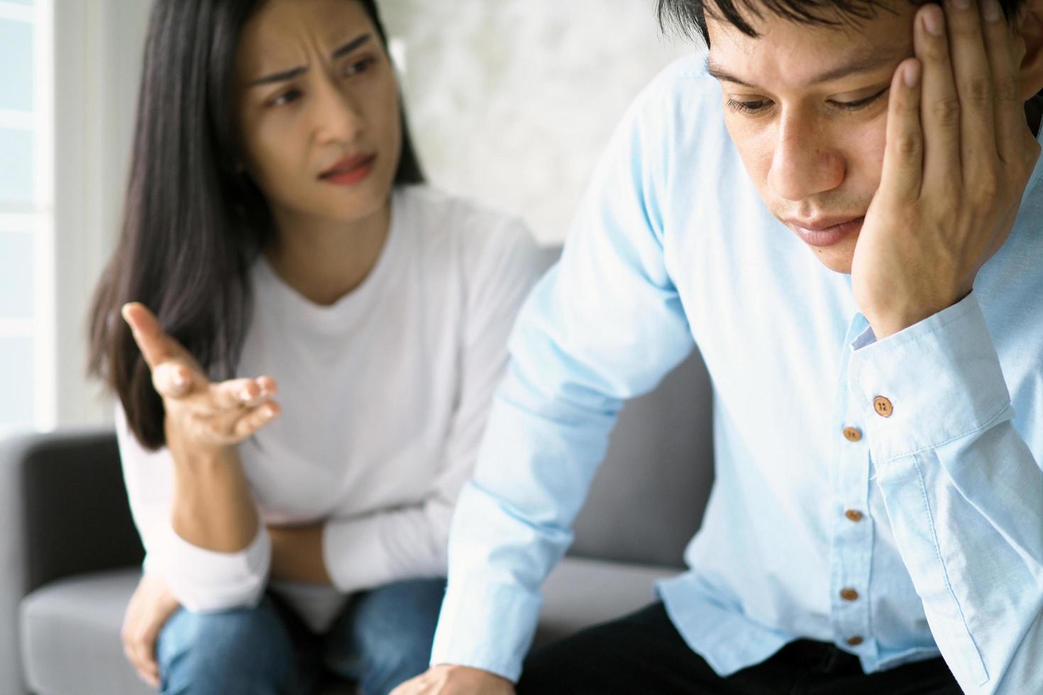 The husband is bored when the wife complains of bad behavior inside the house. Post-marriage behavior. photo