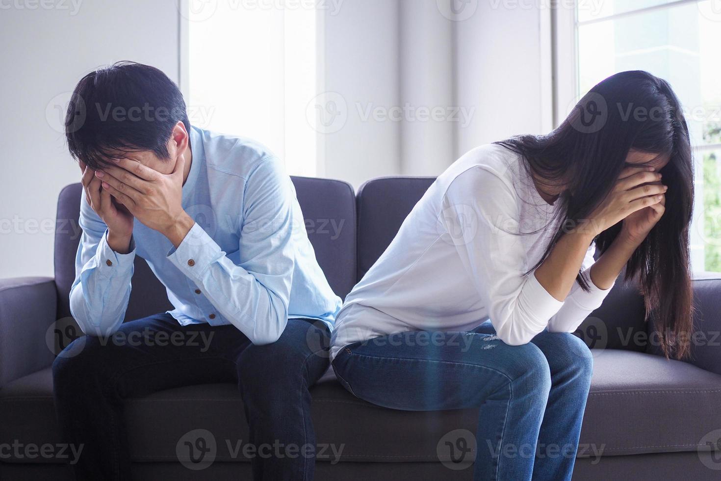Couples are stressed and crying after an argument. Family crises and relationship problems that are about to end photo