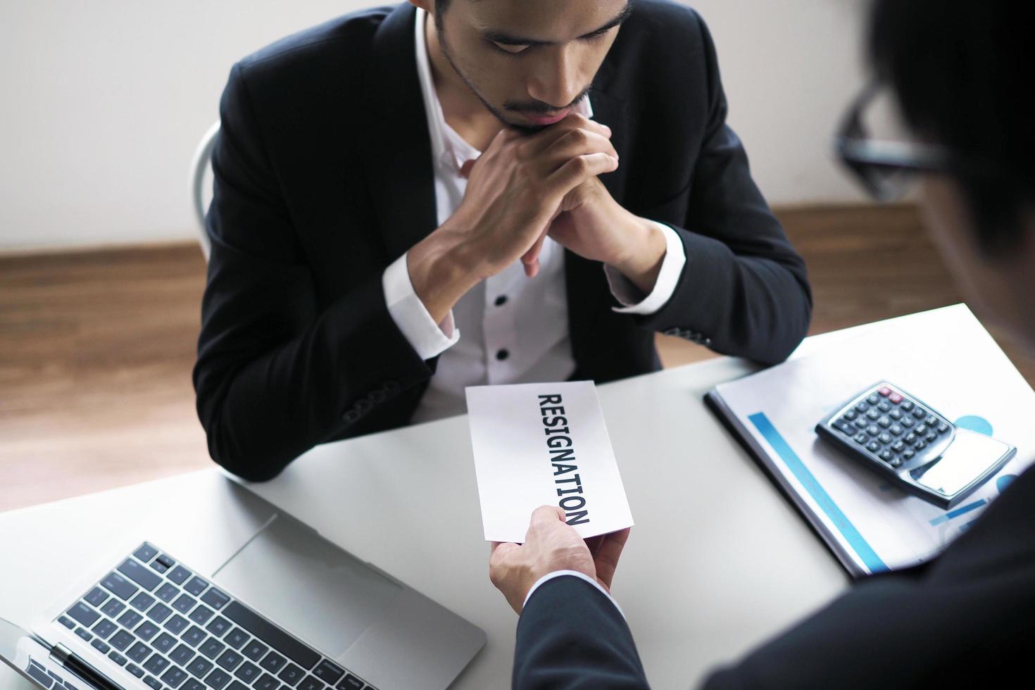 The businessman sent a resignation letter to the management. Including about resignation from job positions and vacancies photo