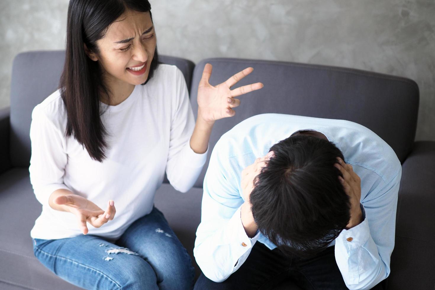 The wife shouted at her husband after knowing that her husband was unfaithful. The quarrel of couples after marriage photo