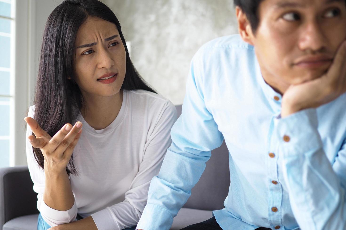 The wife complained and upset her husband with the bad behavior of her husband. Unhappy young wife is fed up with problems after marriage. photo