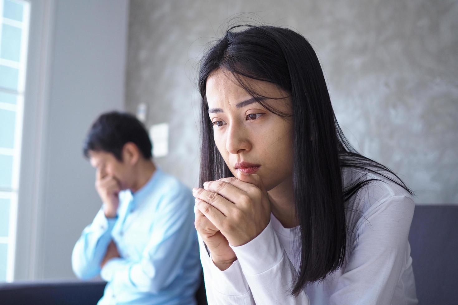 The woman felt depressed, upset and sad after fighting with her husband's bad behavior. Unhappy young wife bored with problems after marriage. photo