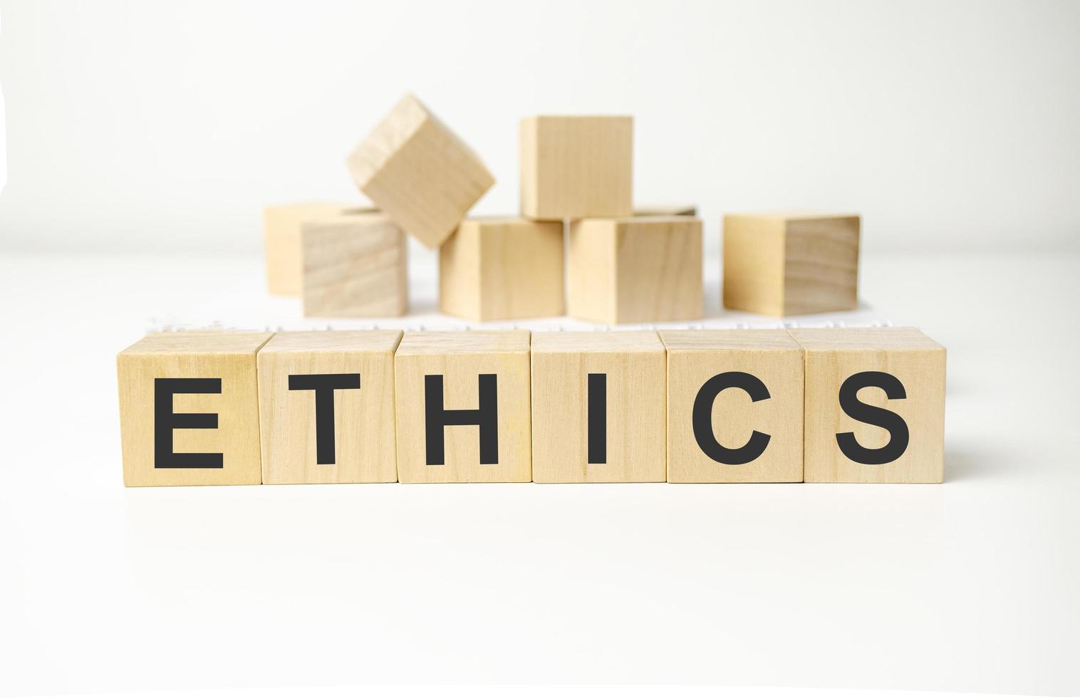 Ethics - words from wooden blocks with letters, ethics moral philosophy concept, photo