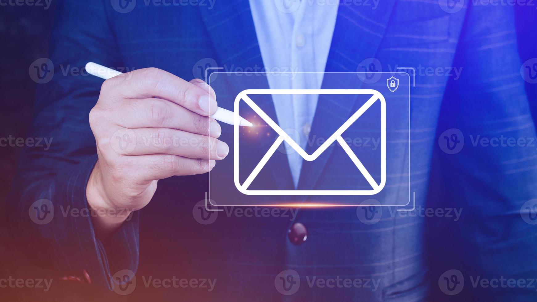 Businessman holding checking email online with virtual interface technology. Direct marketing, online message, E-mail, electronic mail, communication concept. photo