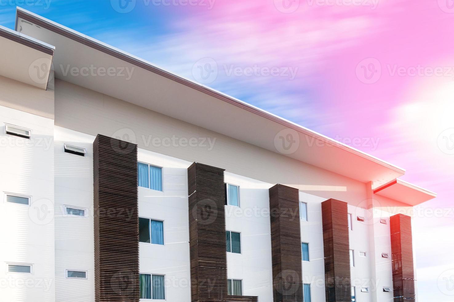 New apartment building over blue sky,Low Angle Architectural Exterior View of Modern photo
