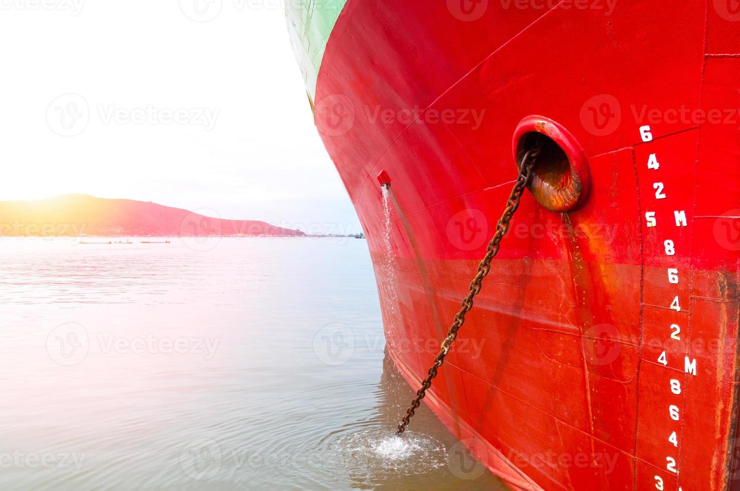 part of ship Large cargo ship  with many shipping container in harbor ,ship in harbor thailand photo