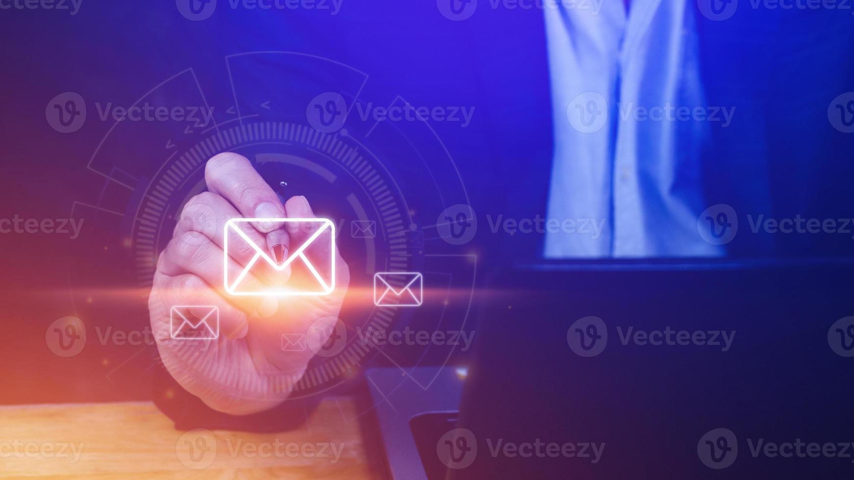 Businessman touching checking email online with virtual interface technology. Direct marketing, online message, Email, electronic mail,communication concept. photo