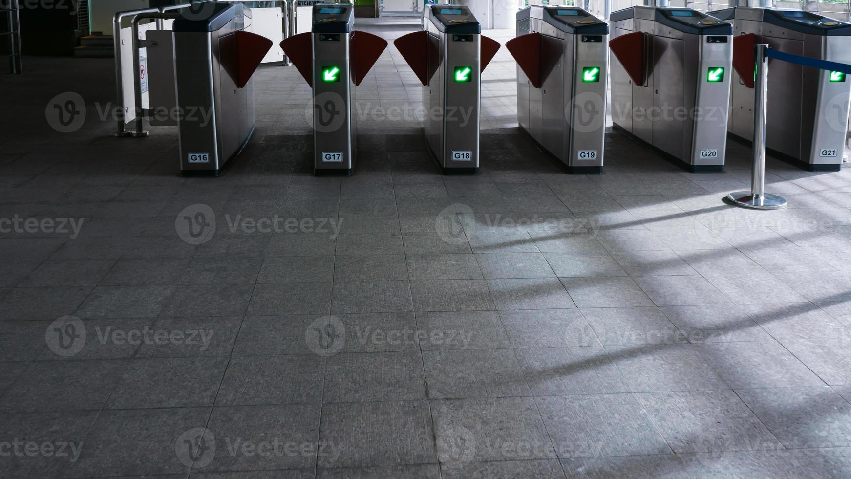 Entrance to the metro station turnstiles,subway walking in the Entrance of Underground station photo