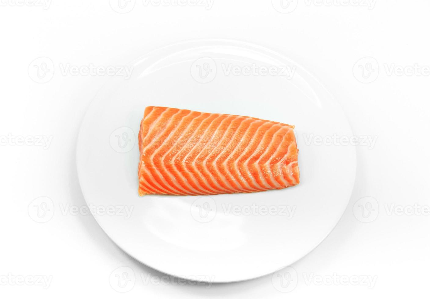 raw fish Salmon on white dish on white background ,salmon steak photo
