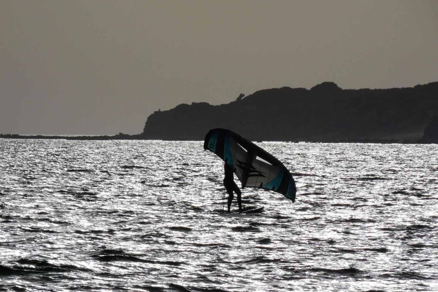 windsurfing, kitesurfing, water and wind sports powered by sails or