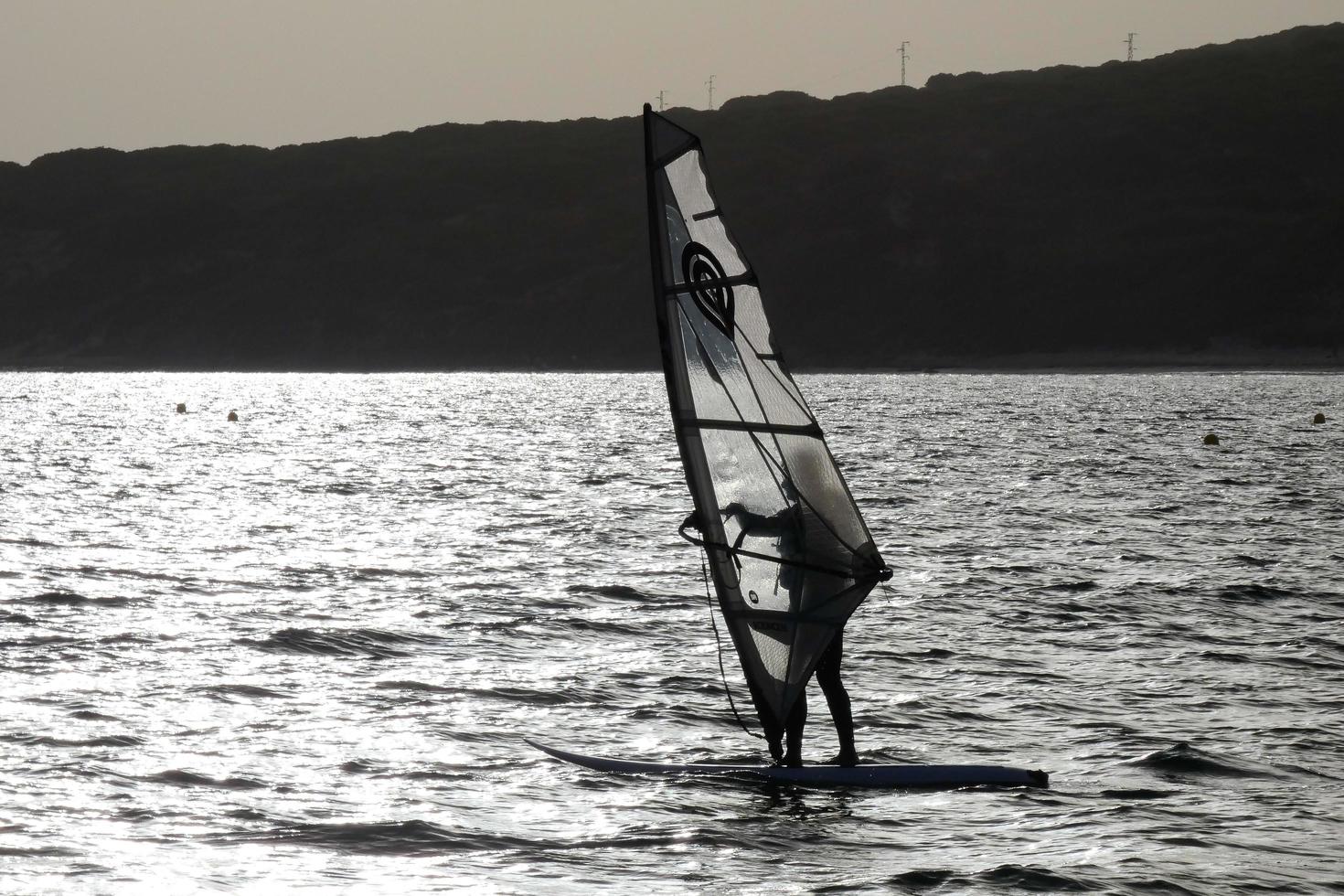 windsurfing, kitesurfing, water and wind sports powered by sails or kites photo