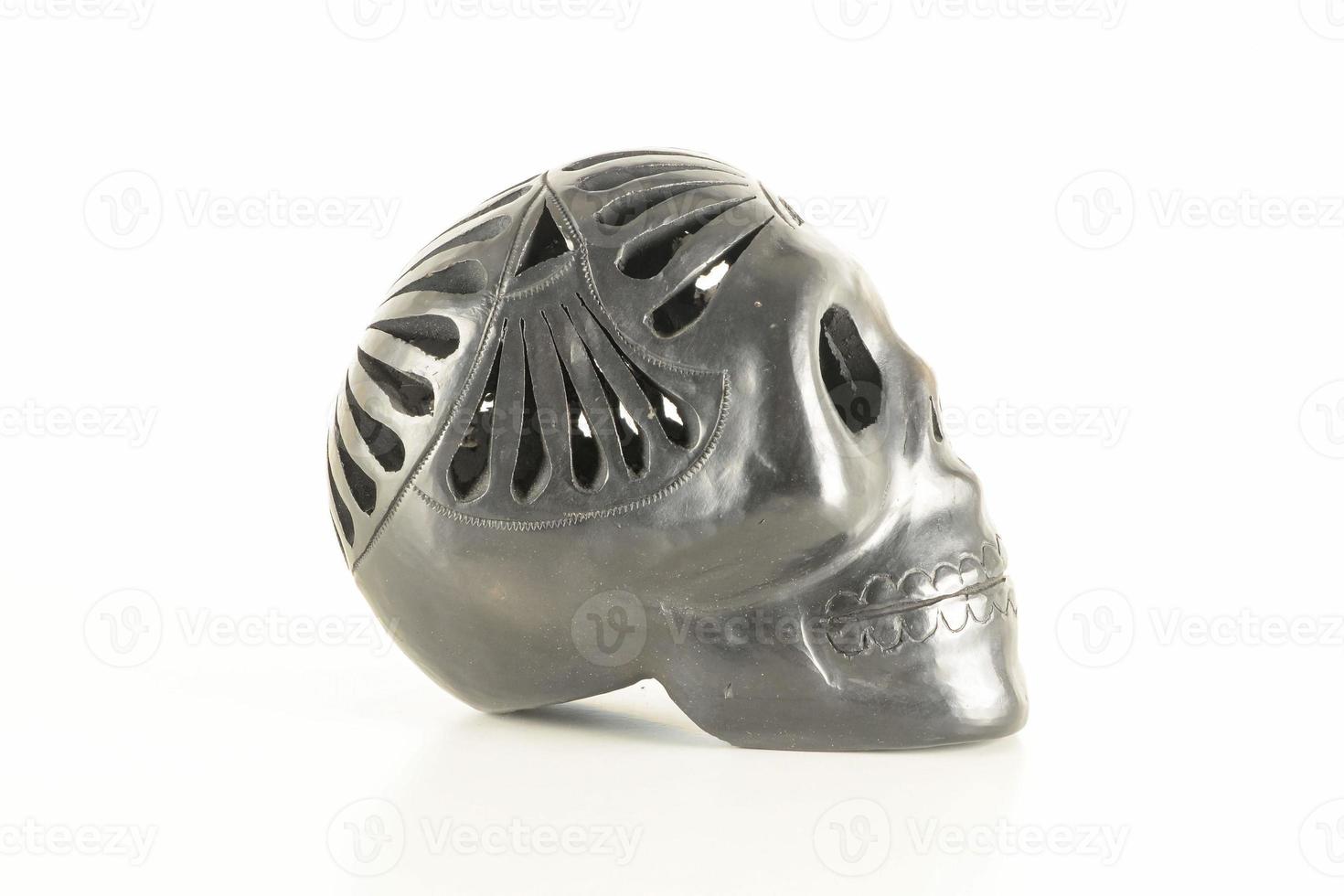 Metal skull on white background photo