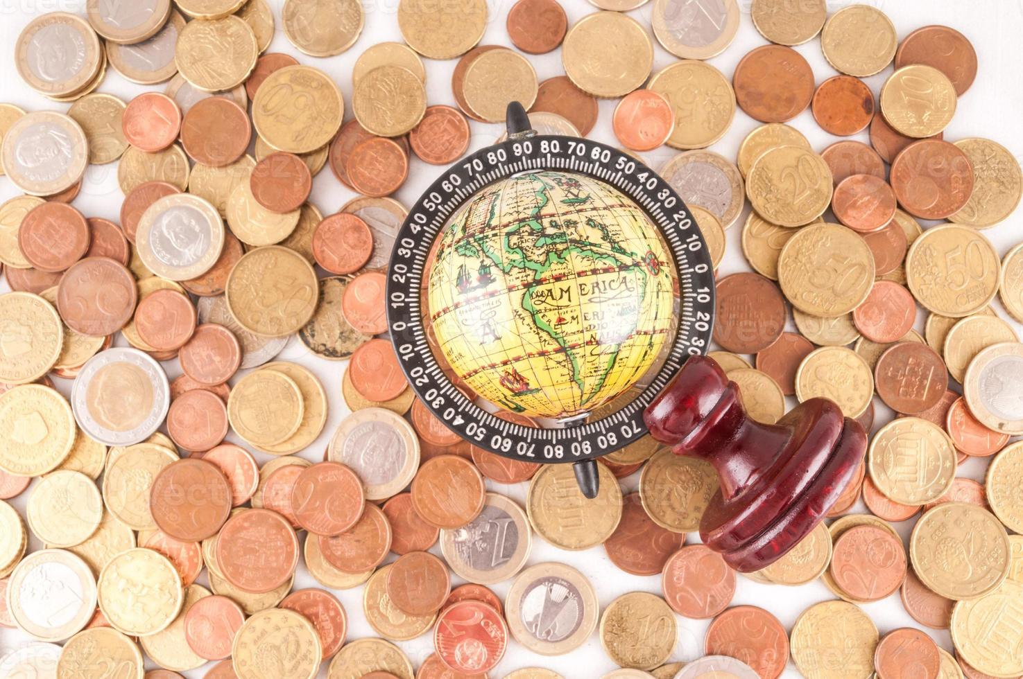 Globe on coins photo