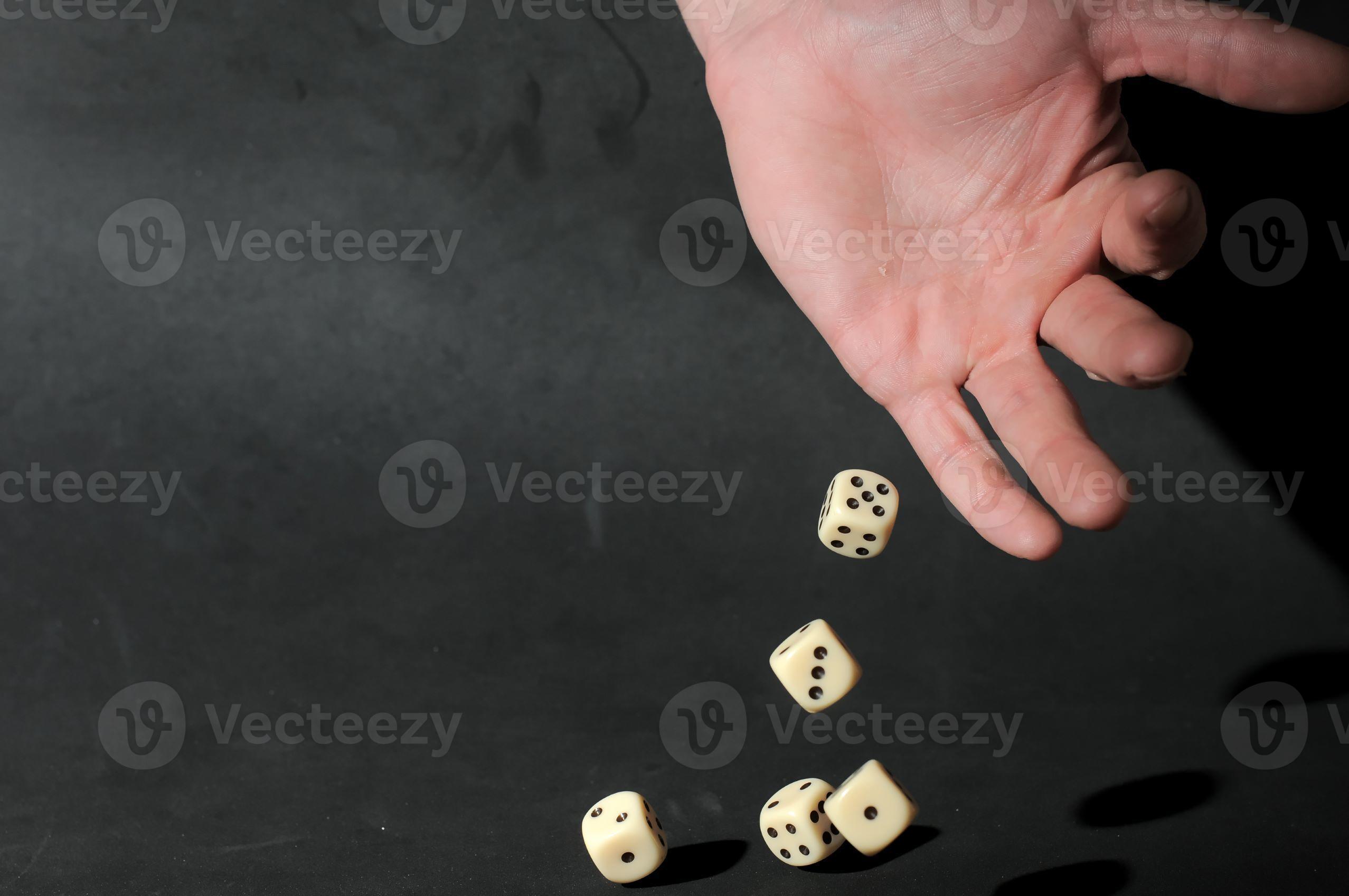 Hand throwing Dice 19072905 Stock Photo at Vecteezy