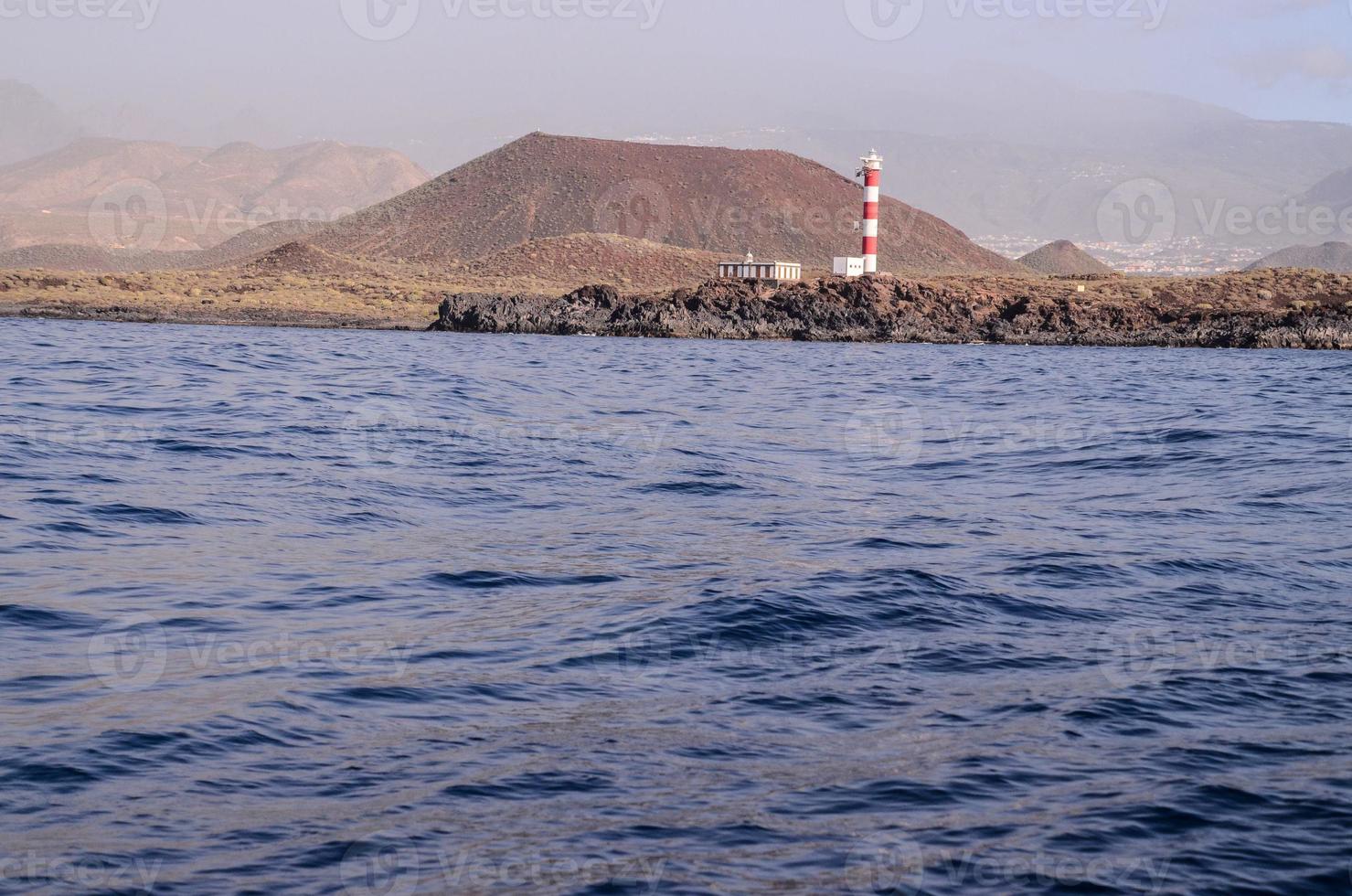 faro junto al mar foto