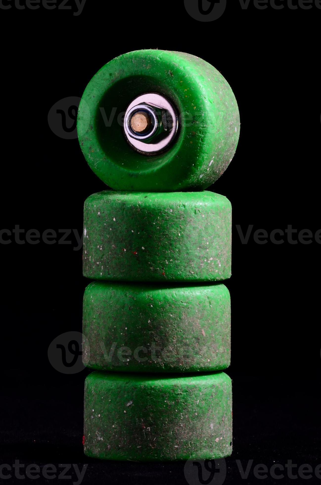 Skateboard wheels on black background 19073027 Stock Photo at Vecteezy