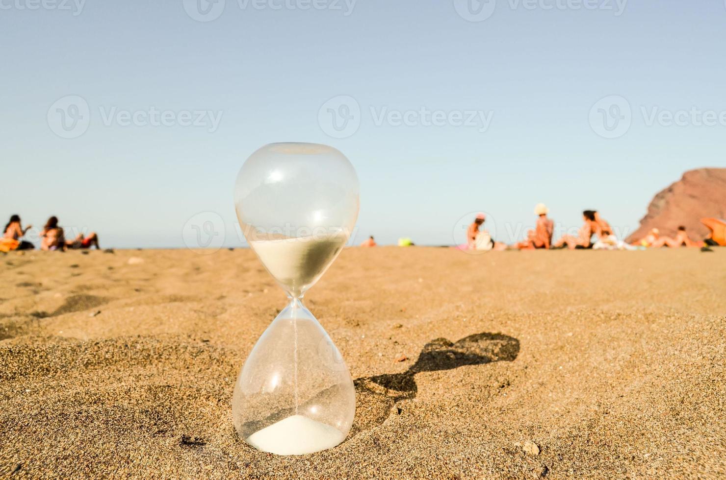 Hourglass on the beach photo