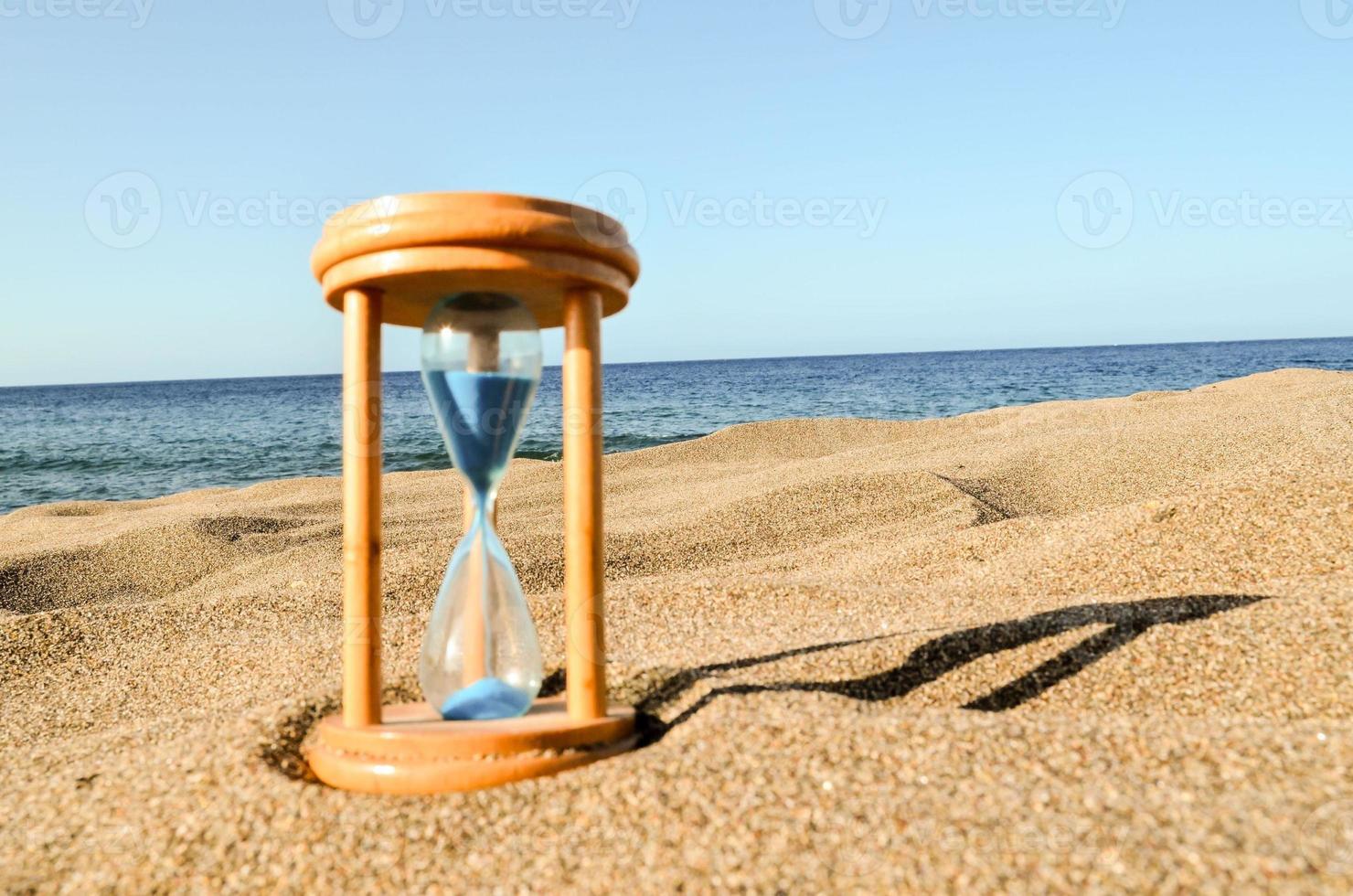 Hourglass at the beach photo