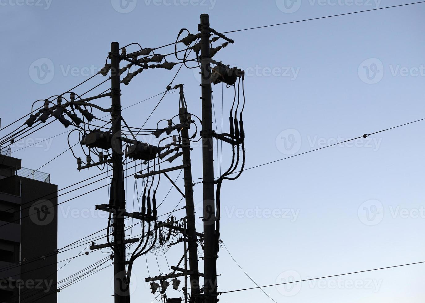 Power lines in Japan in the evening hours 19078960 Stock Photo at Vecteezy