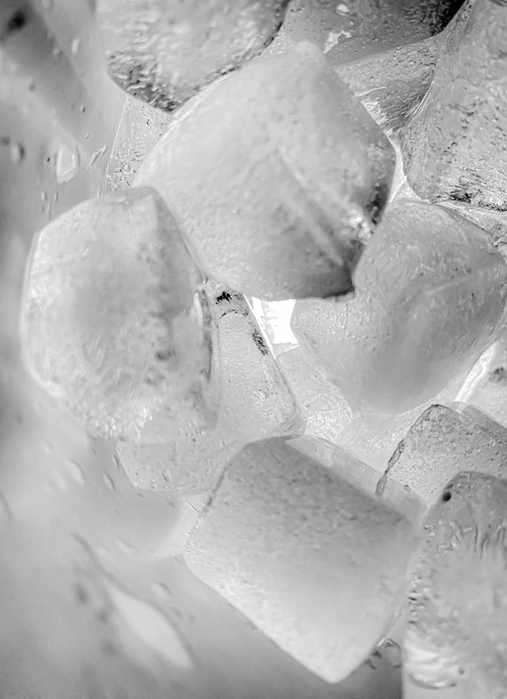 Ice cubes background, ice cube texture or background It makes me feel fresh and feel good, In the summer, ice and cold drinks will make us feel relaxed, Made for beverage or refreshment business. photo