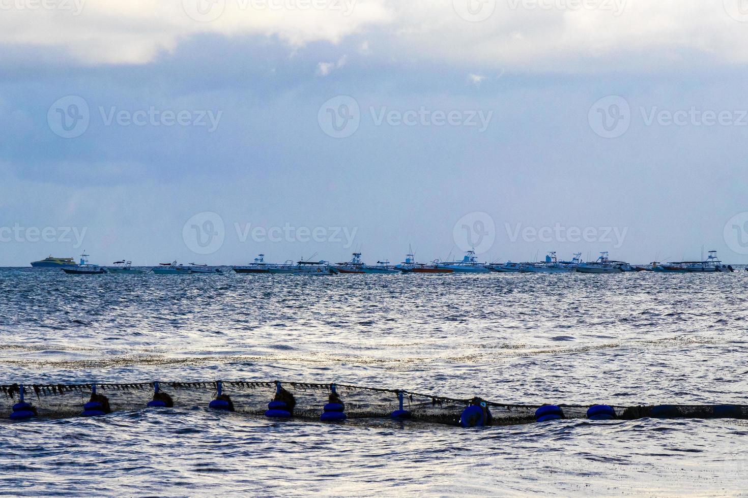 Boats yachts ship jetty beach in Playa del Carmen Mexico. photo