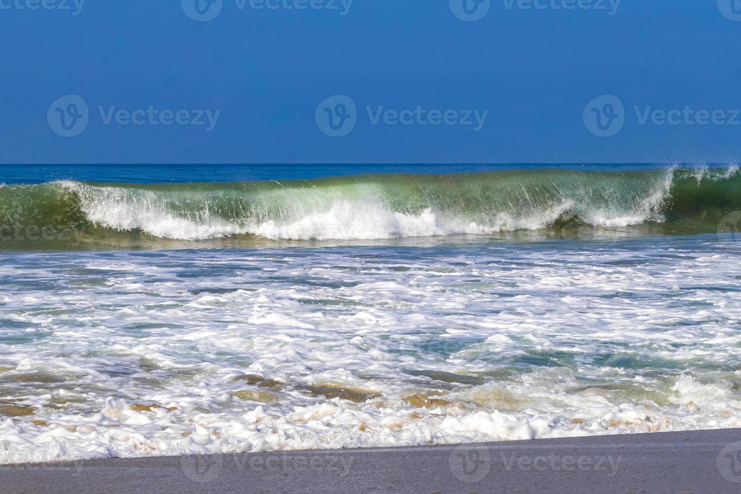 Extremely huge big surfer waves at beach Puerto Escondido Mexico. photo