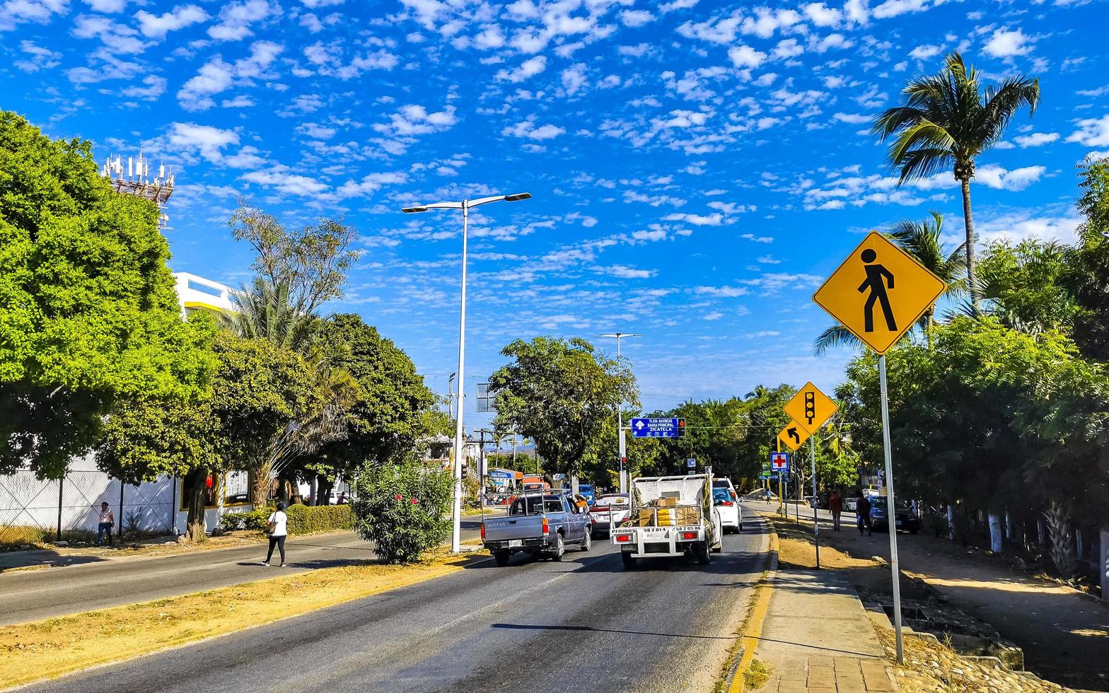 Puerto Escondido Oaxaca Mexico 2023 Busy road street driving cars traffic jam Puerto Escondido Mexico. photo