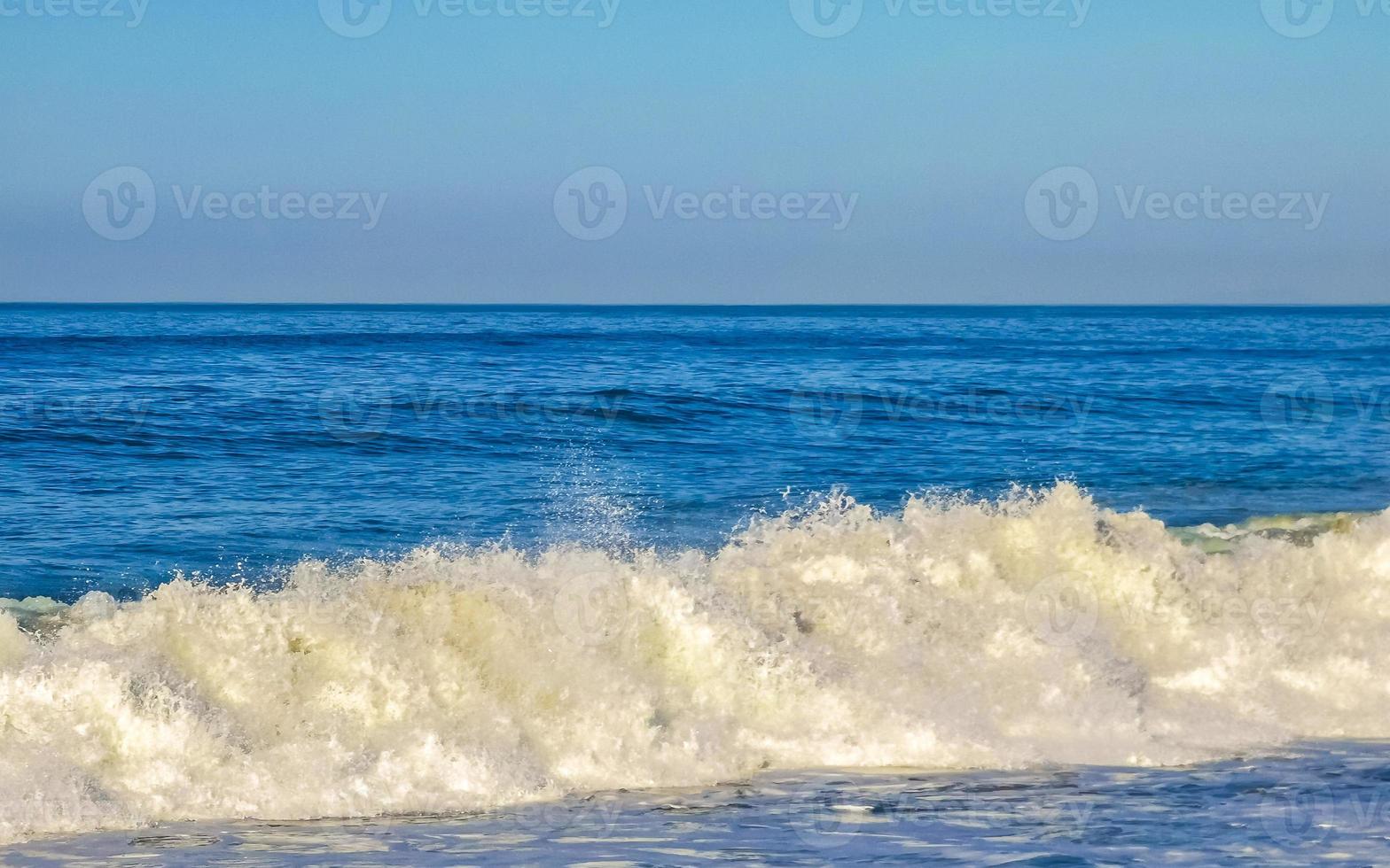 Extremely huge big surfer waves at beach Puerto Escondido Mexico. photo