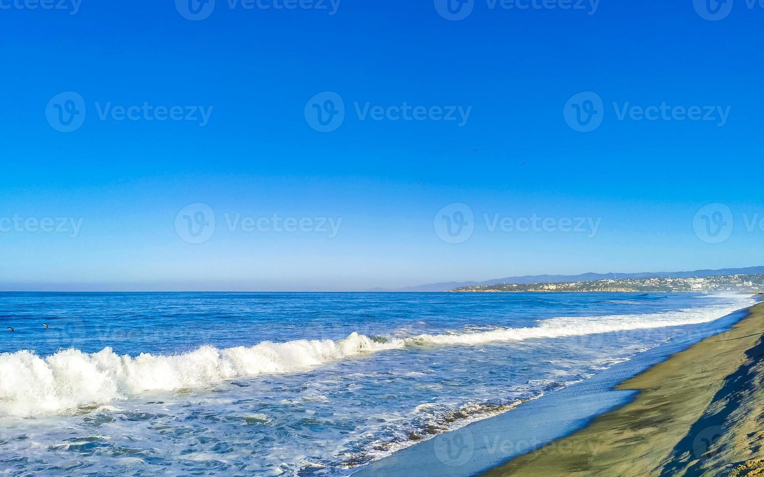 Extremely huge big surfer waves at beach Puerto Escondido Mexico. photo