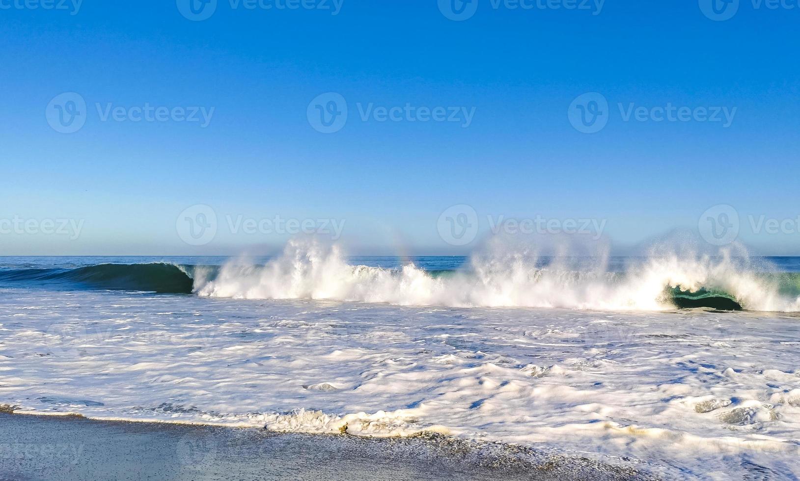 Extremely huge big surfer waves at beach Puerto Escondido Mexico. photo