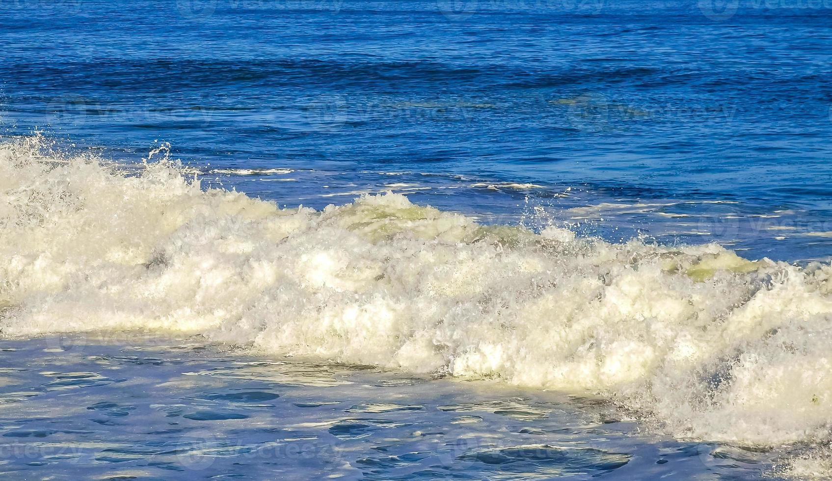 Extremely huge big surfer waves at beach Puerto Escondido Mexico. photo