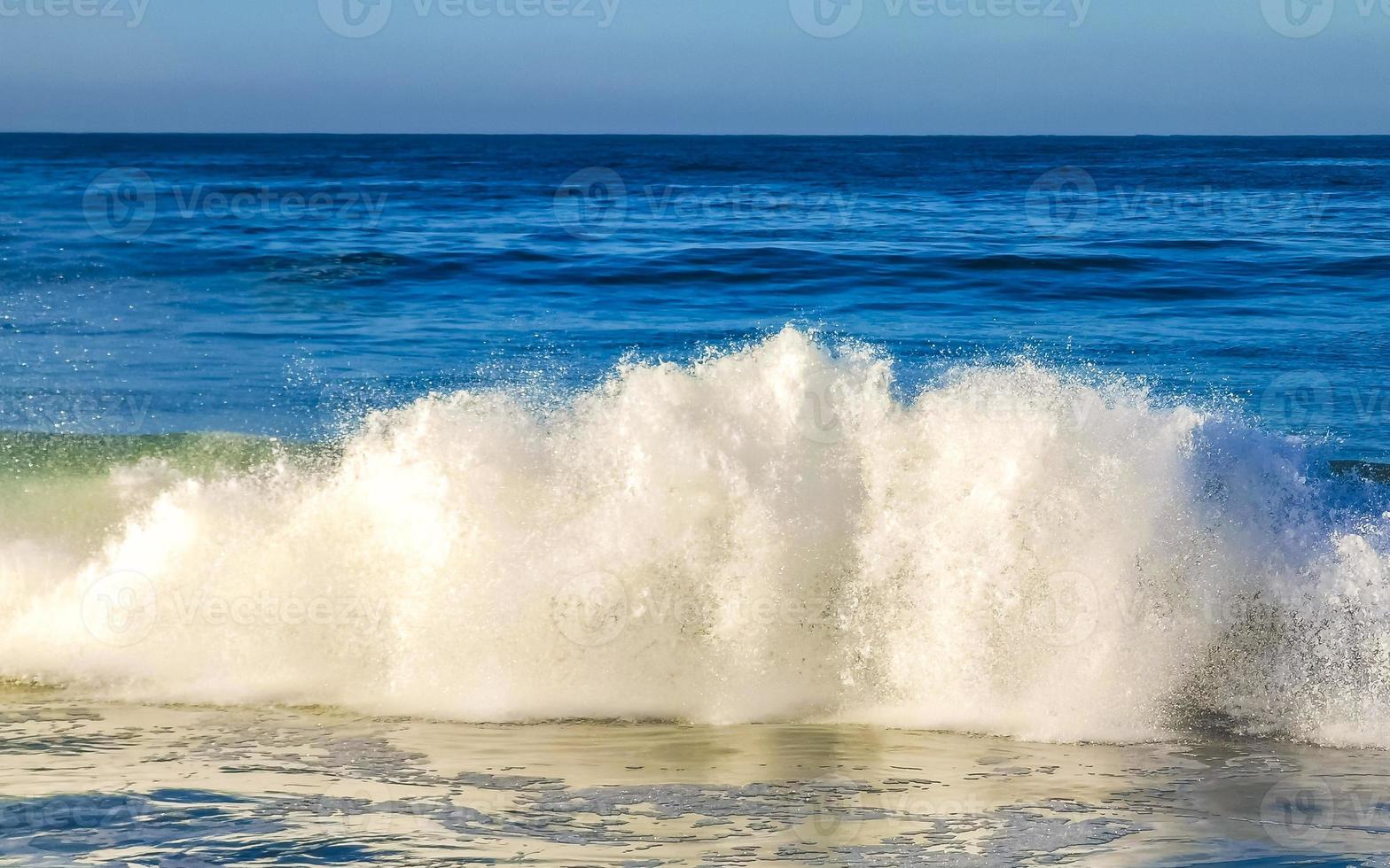 Extremely huge big surfer waves at beach Puerto Escondido Mexico. photo