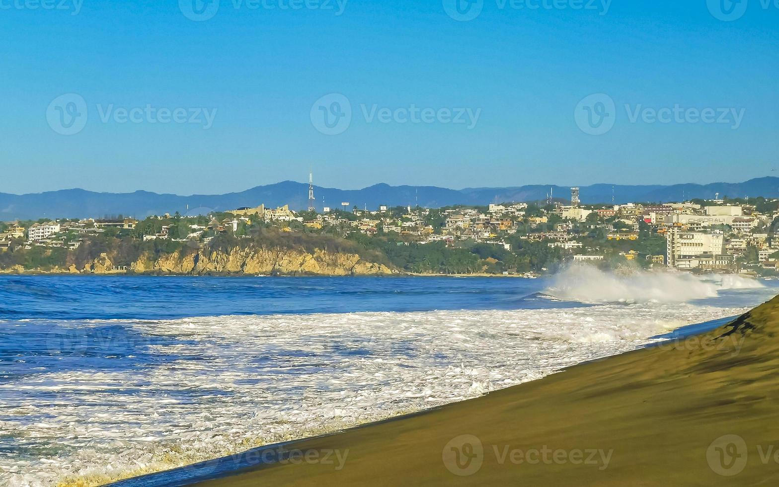 Extremely huge big surfer waves at beach Puerto Escondido Mexico. photo