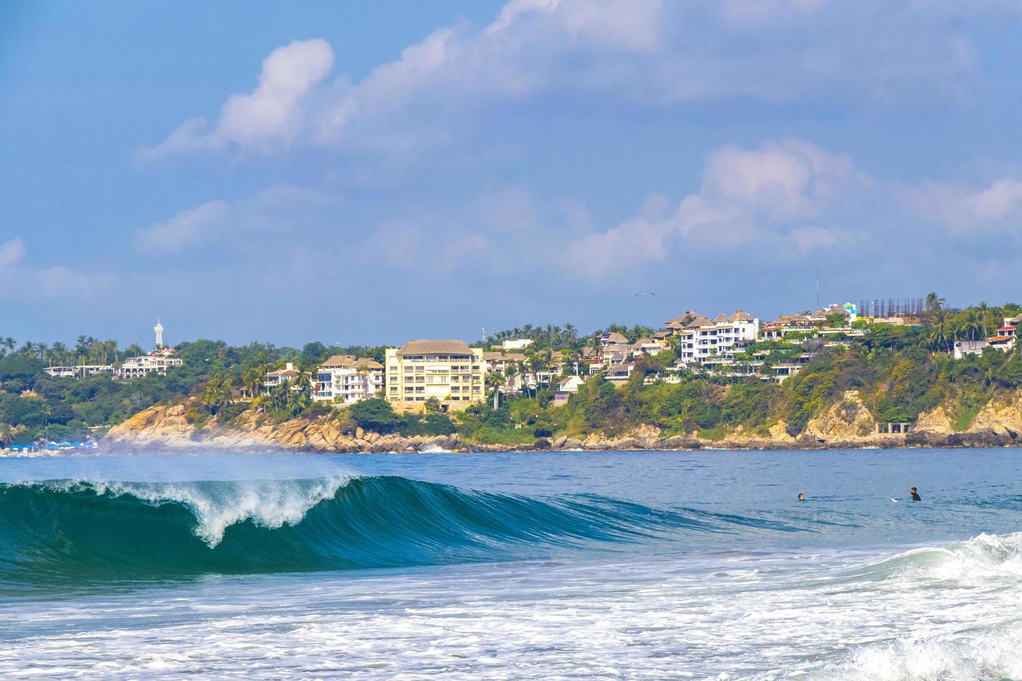 Puerto Escondido Oaxaca Mexico 2022 Surfer surfing on surfboard on high waves in Puerto Escondido Mexico. photo