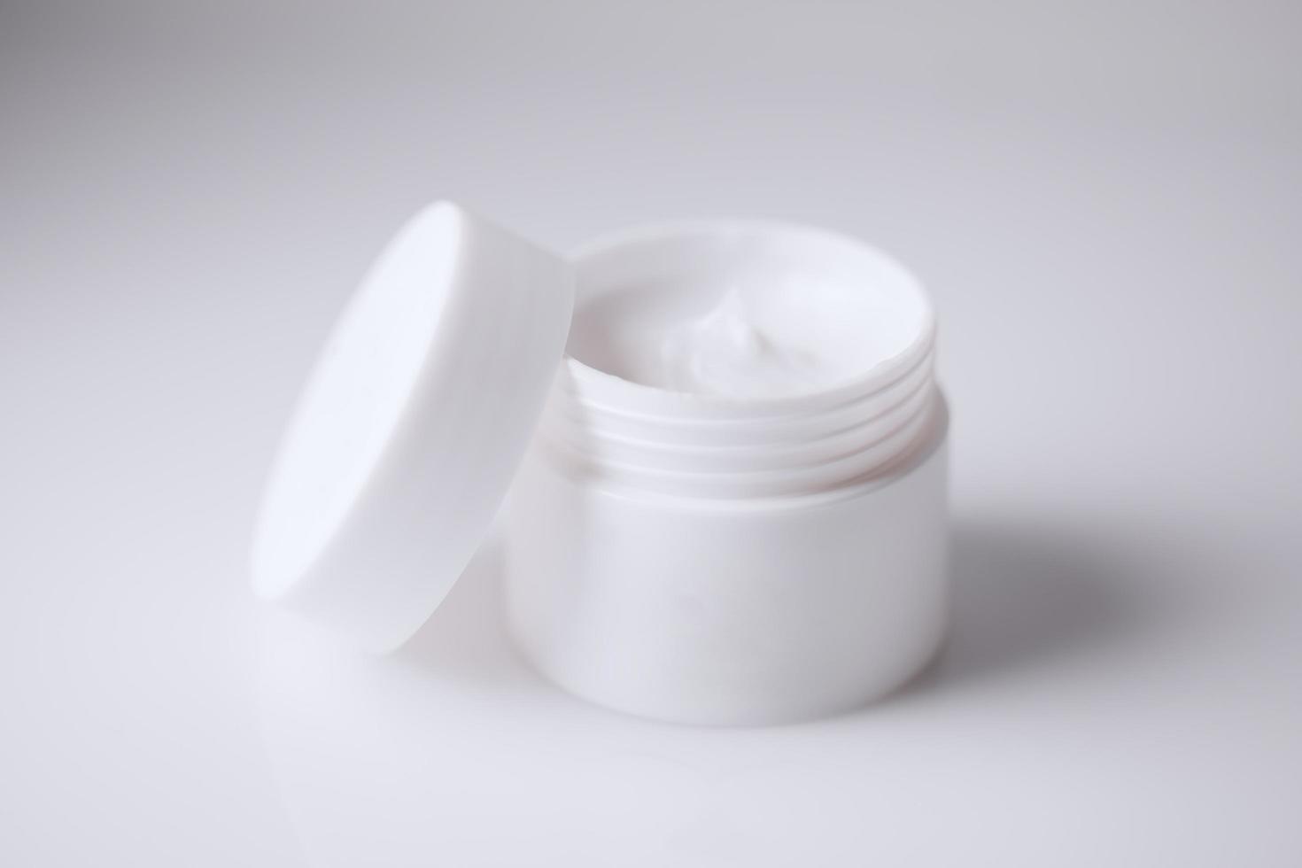 cosmetic cream isolated on white background, organic beauty cosmetics, home spa, flat lay background photo