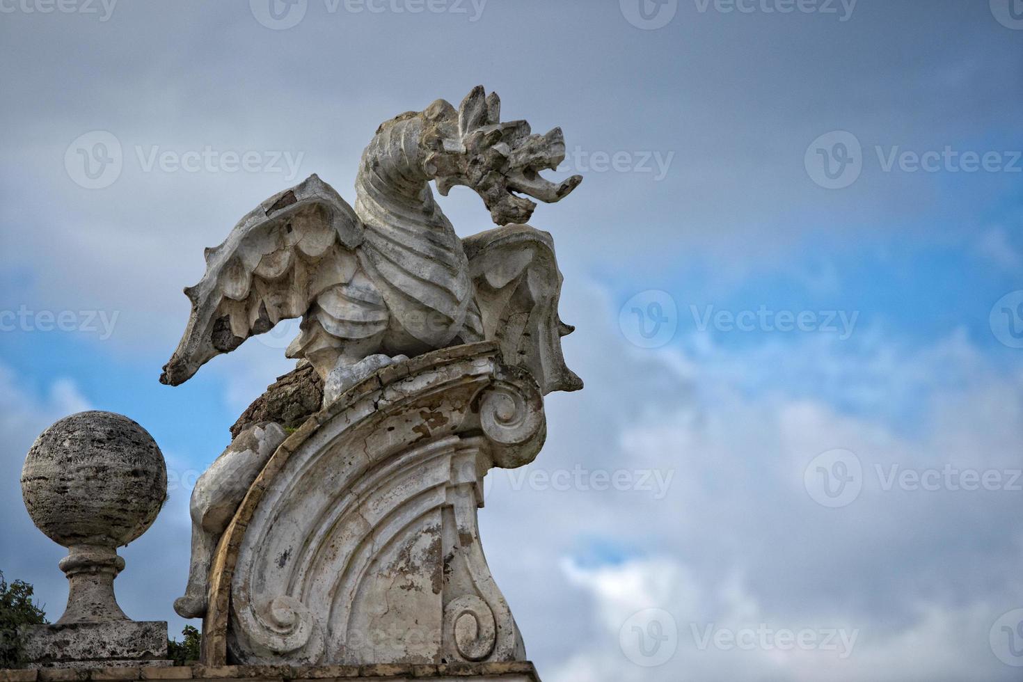 stone dragon statue photo