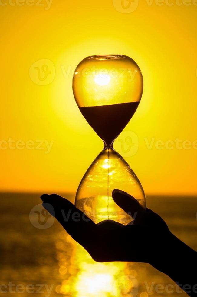 Hourglass over the sunset photo