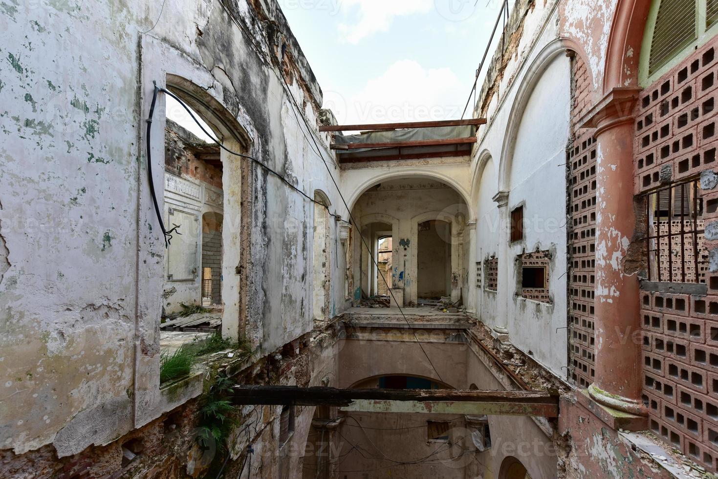 Old building in the process of collapsing in the Old Havana neighborhood of Havana, Cuba. photo