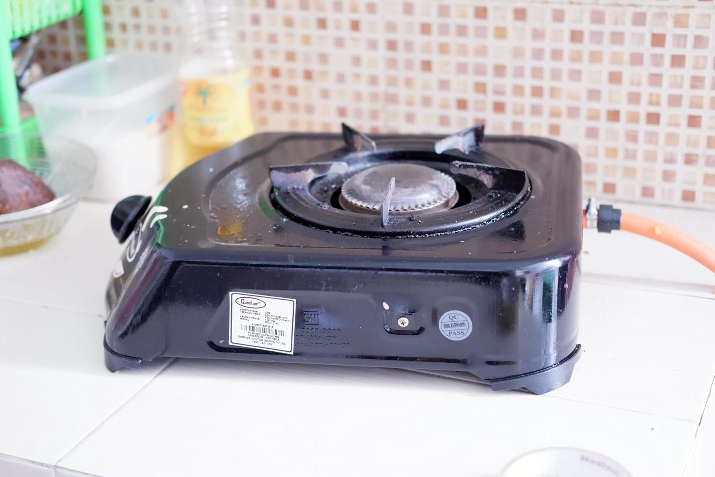 Black portable tourist gas stove photo