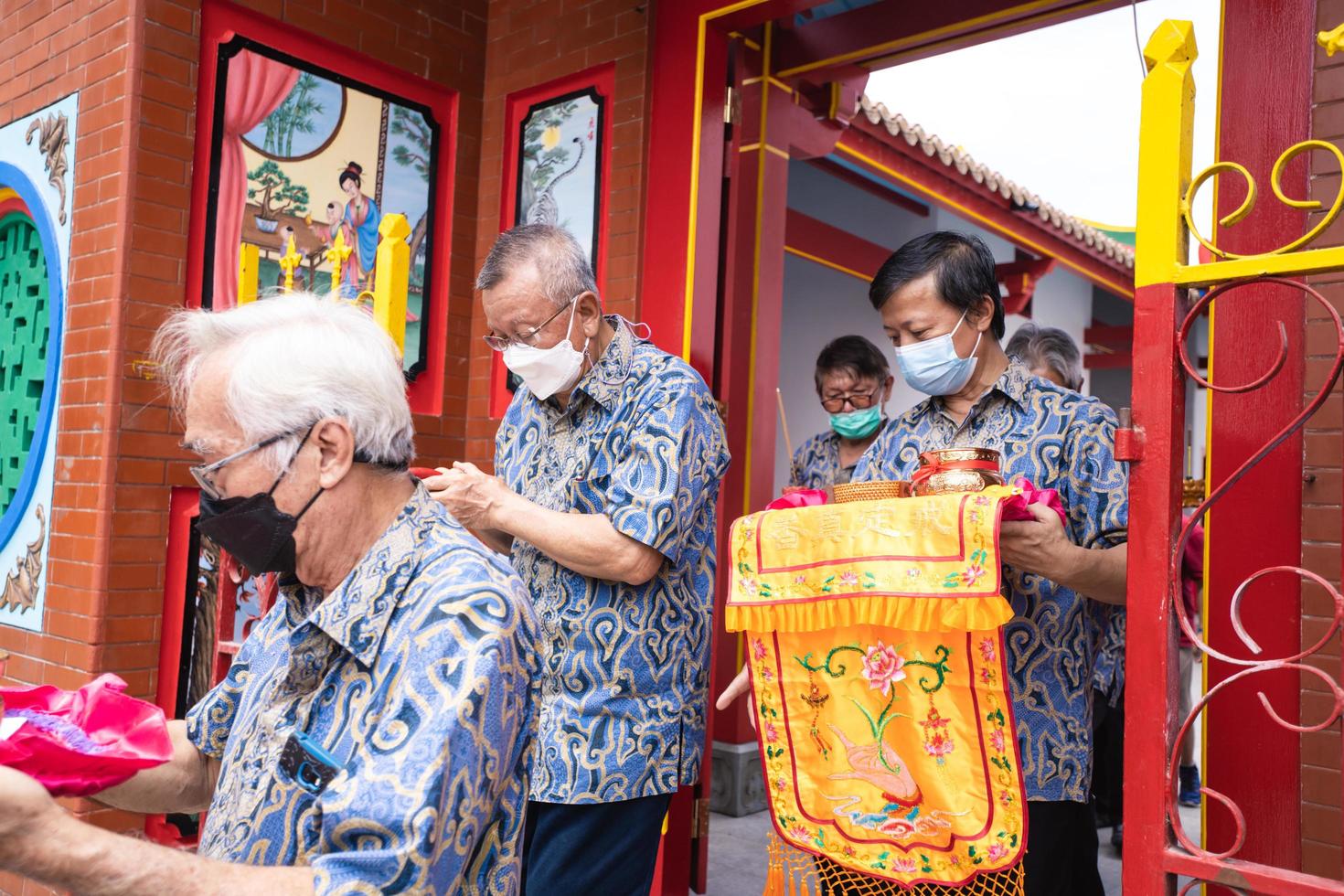 Bandung City, Indonesia, 2022 - The visitor praying together with the monks in front of the offerings to the god photo