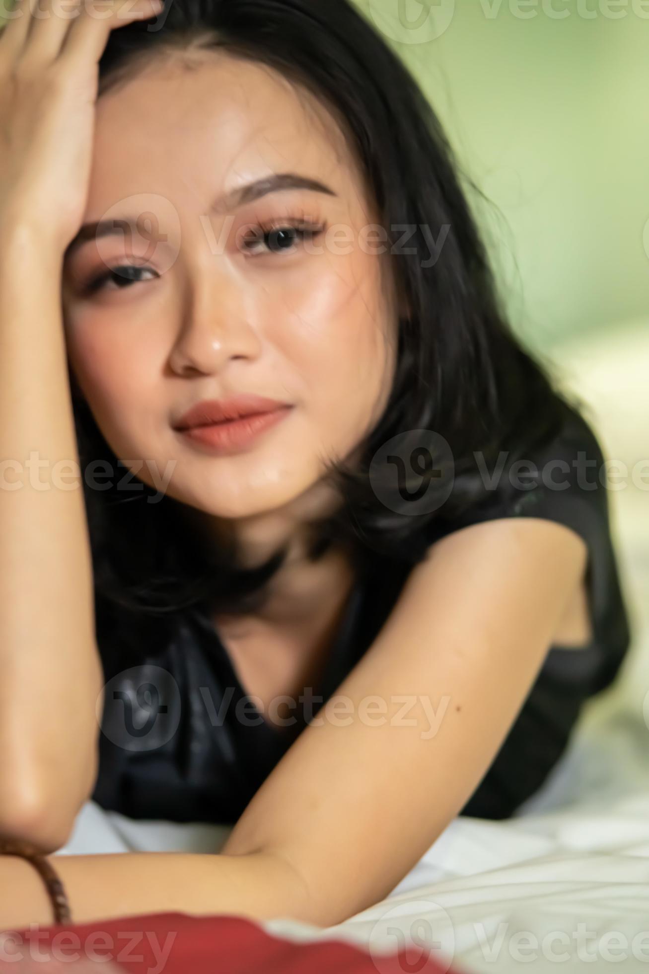 Indonesian Women being headache after swallowing a medicine for her ill